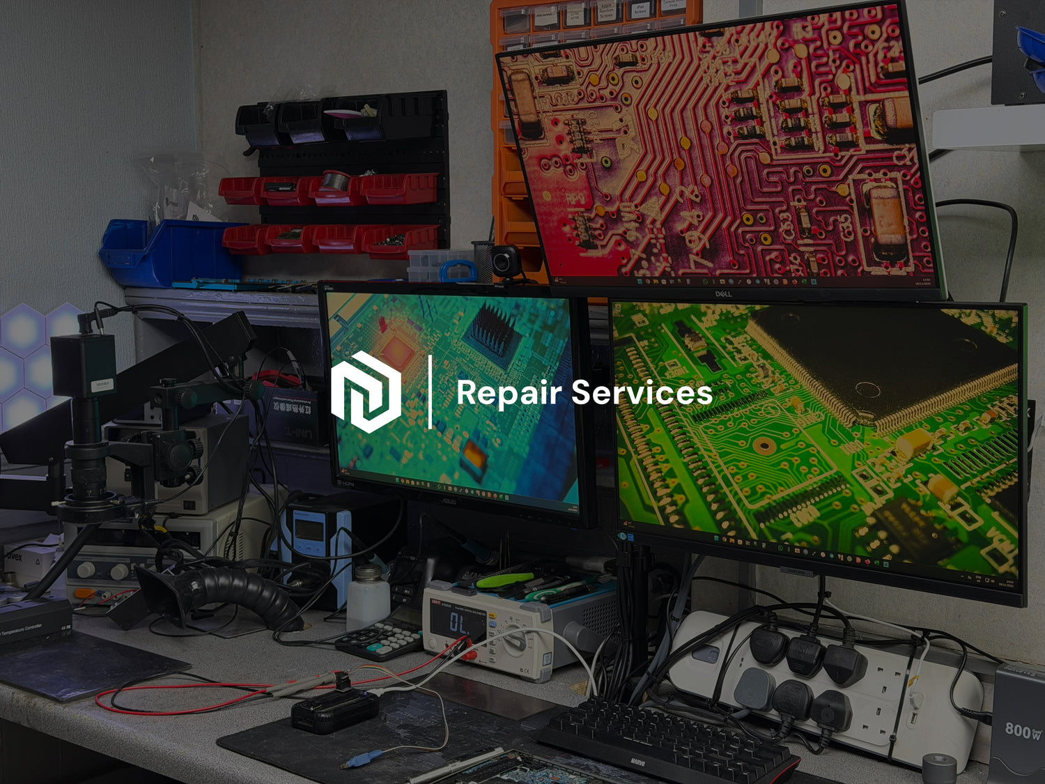Image of computer monitors with Kybernet Repair Services overlaid on top.